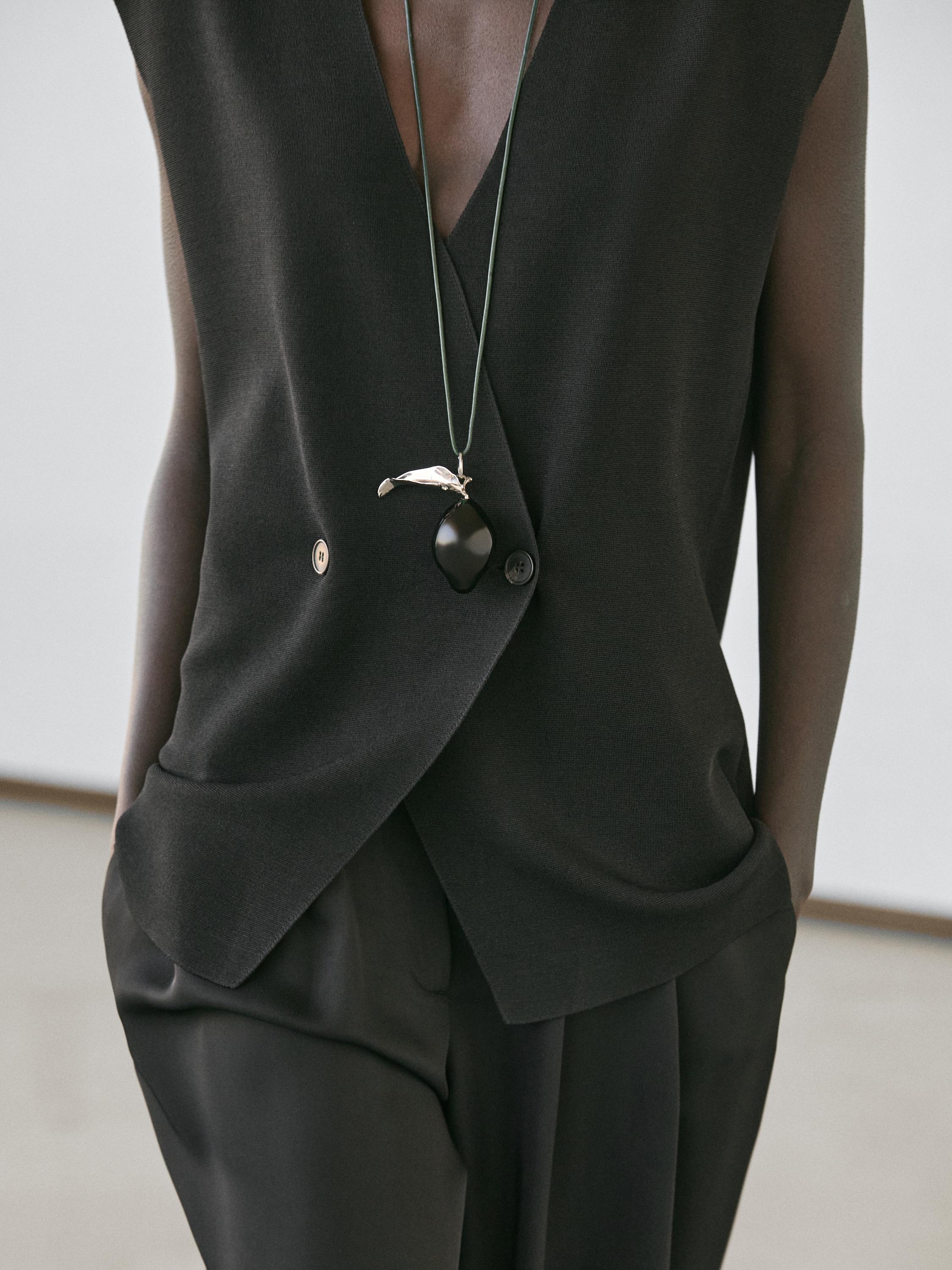 Long double-breasted vest